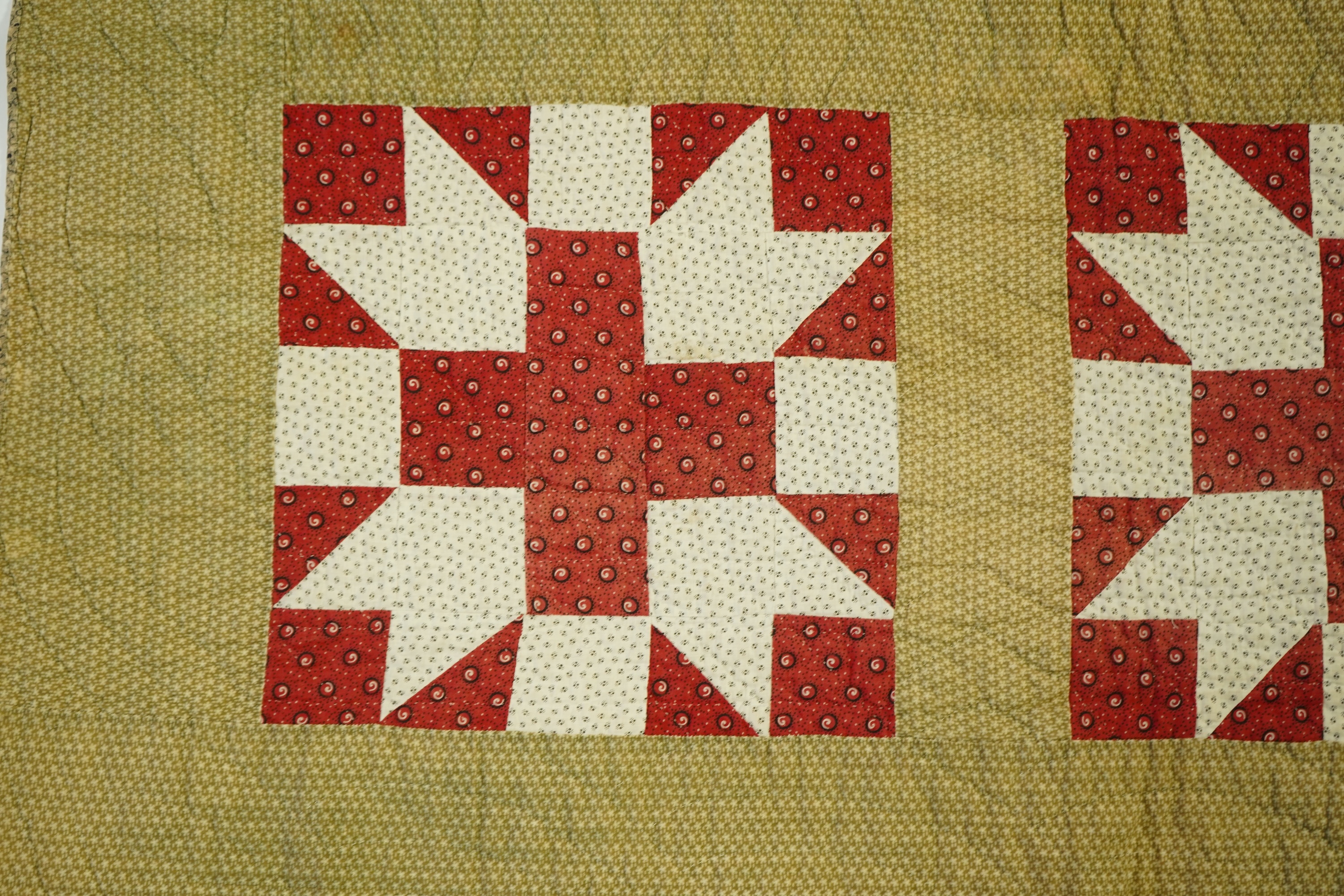 A late 19th century American, York County patchwork quilt, a similar pattern to Wild Goose Chase. Hand pieced and hand quilted, with label on reverse: York County Quilt documentation Project. G 53-2. The front worked in